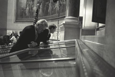 President Clinton and Vice President Gore view the charters of freedom in the National Archives rotunda