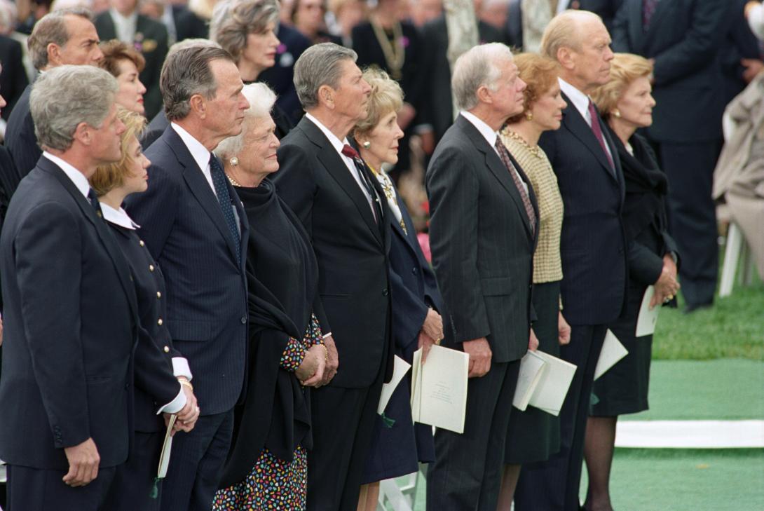 President Clinton and First Lady Hillary Rodham Clinton attending the funeral of President Richard Nixon in Yorba Linda, California. Former Presidents Bush, Reagan, Carter and Ford with First Ladies: Barbara Bush, Nancy Reagan, Rosalynn Carter and Betty Ford are present. Photographed by Barbara Kinney