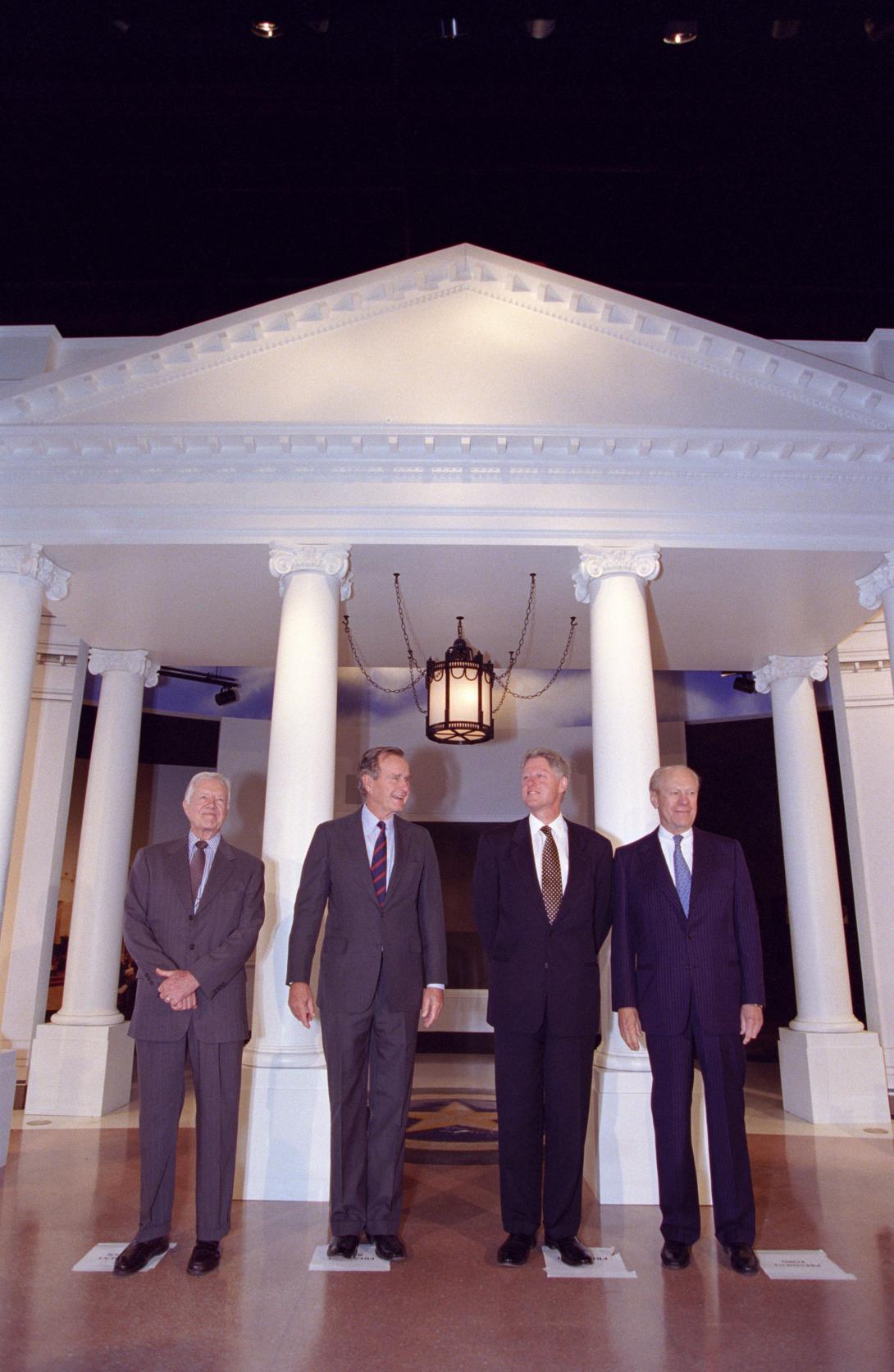 President Clinton with Former Presidents George H.W. Bush, Jimmy Carter and Gerald Ford posing for photographs in the George Bush Presidential Library in College Station, Texas.